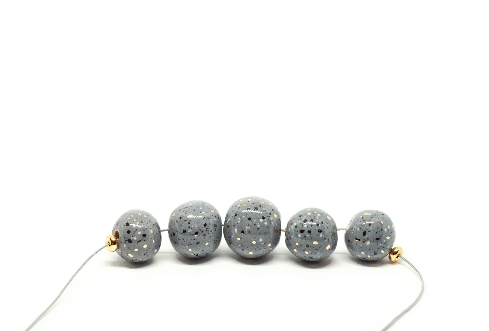 terrazzo necklace with gold terrazzo bubbles gold clayometry