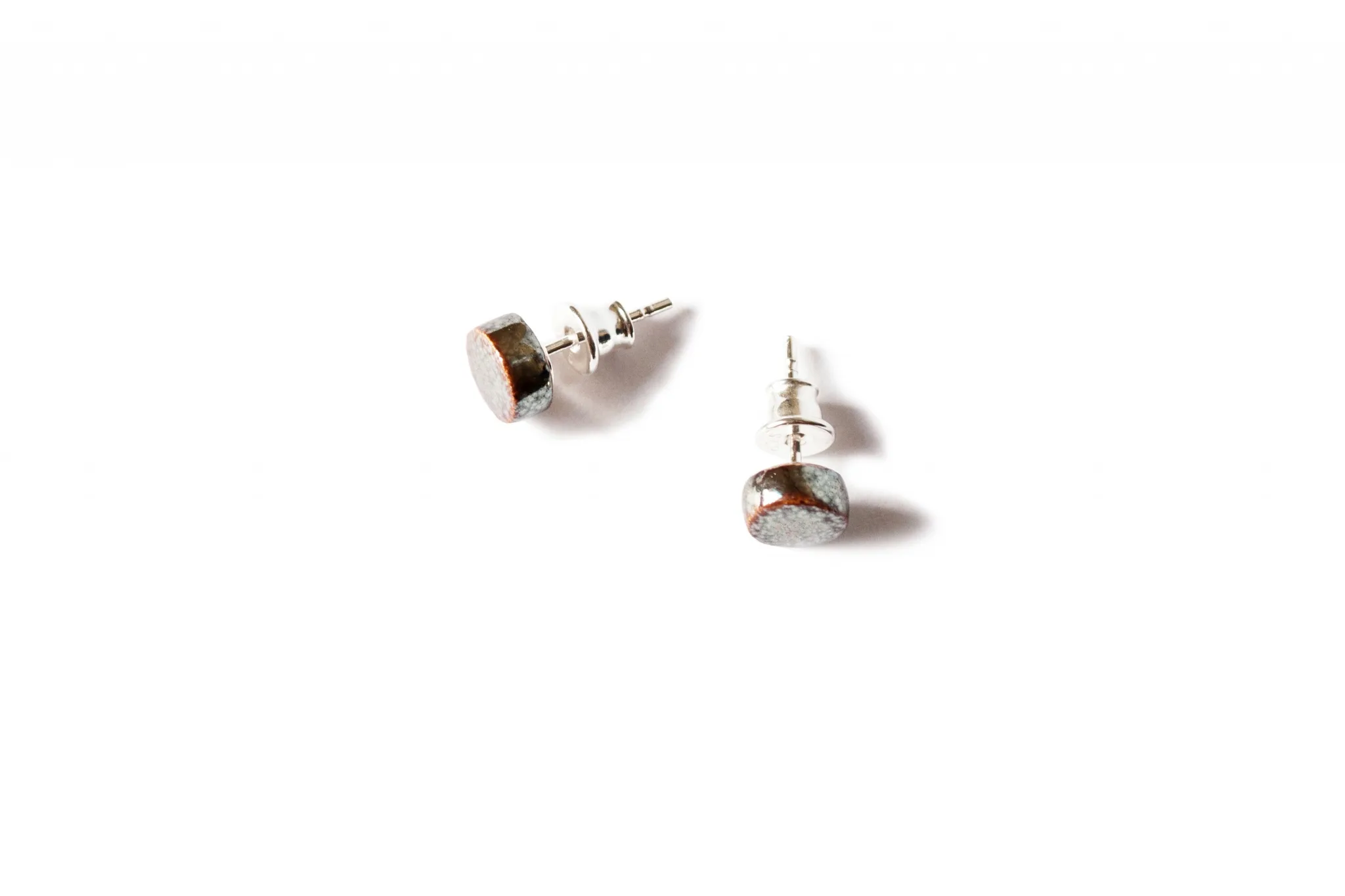 tiny shiny ceramic earrings dot xs clayometry