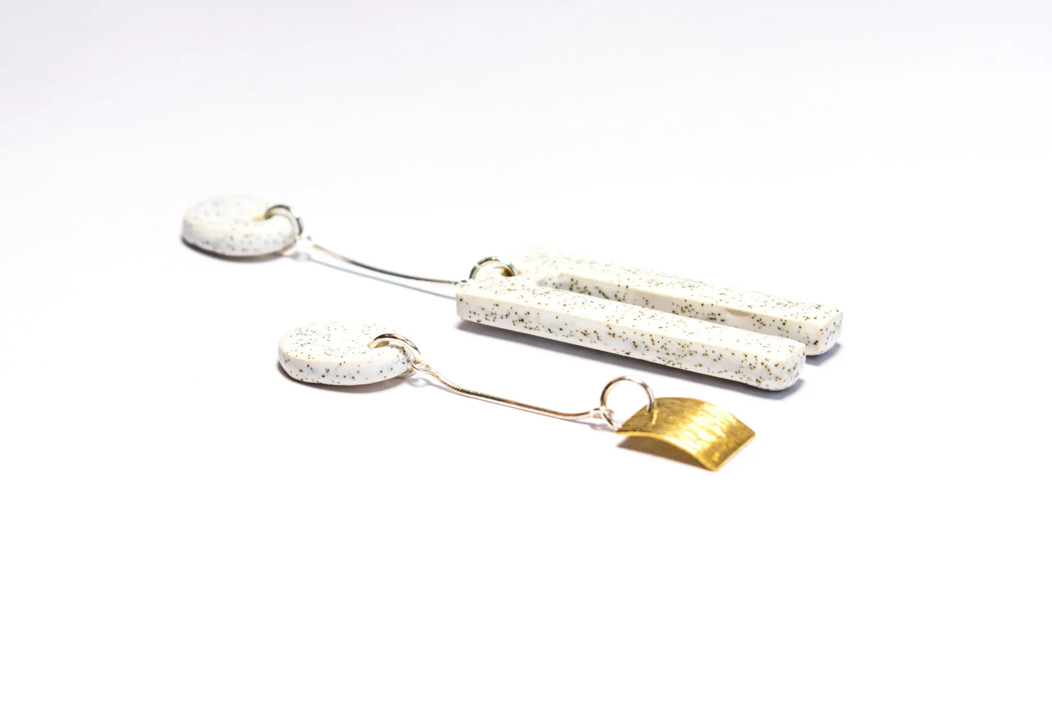 asymmetrical and stylish earrings dingle-dangle different clayometry