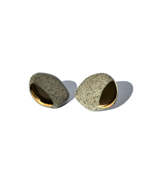 Minimalist ceramic earrings made from grey stoneware clay with gold luster accents