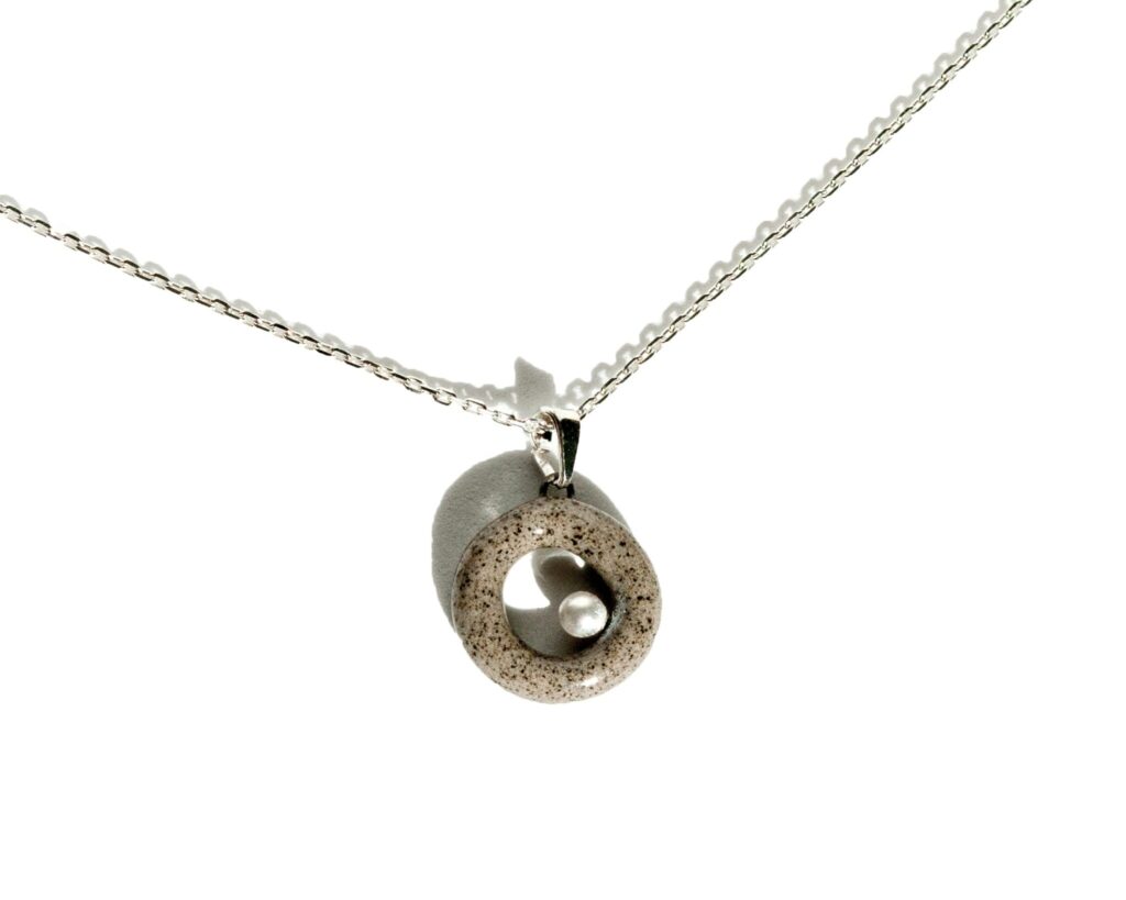 Pearl Whisper handmade ceramic necklace – grey stoneware ring pendant with white pearl on sterling silver chain, by Clayometry