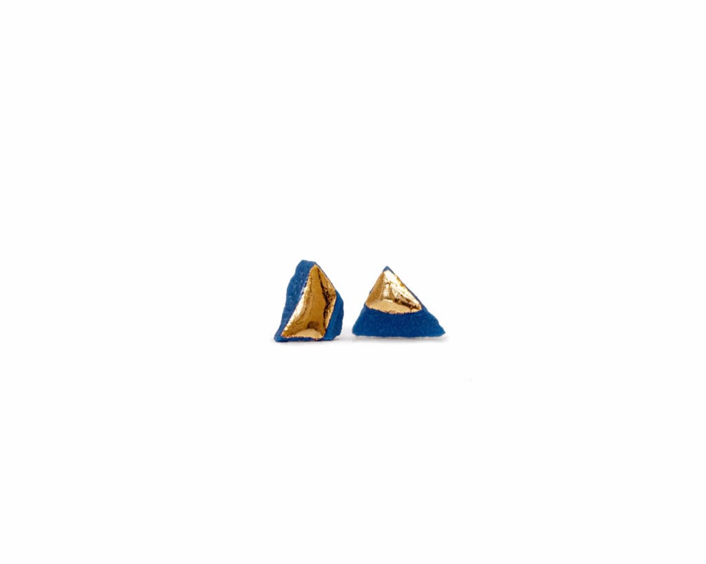 Blue Smithereens Small ceramic stud earrings in blue porcelain with gold luster finish, front view