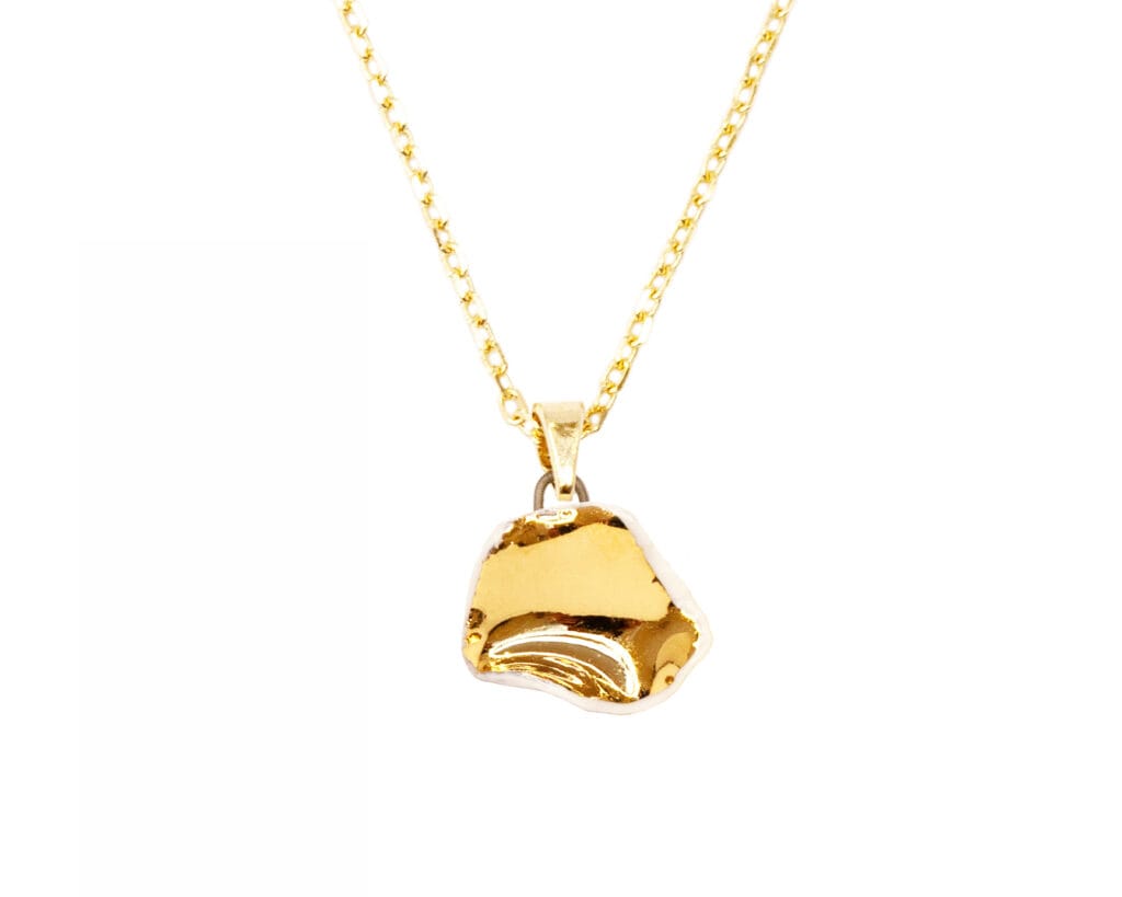 White Matter Small ceramic pendant necklace in white porcelain with gold luster finish, front view