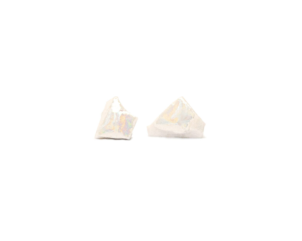 White Smithereens Small handmade porcelain earrings with iridescent mother-of-pearl luster on white background