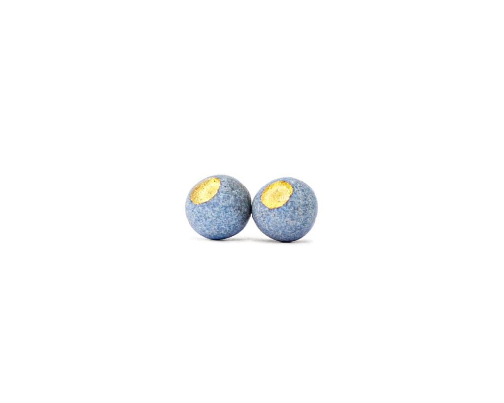 Matte Pearl handmade sky blue stoneware stud earrings with matte gold luster accent, front view