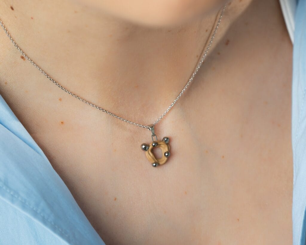 Nude Awakening Platinum handmade nude porcelain pendant necklace with platinum luster, front view
