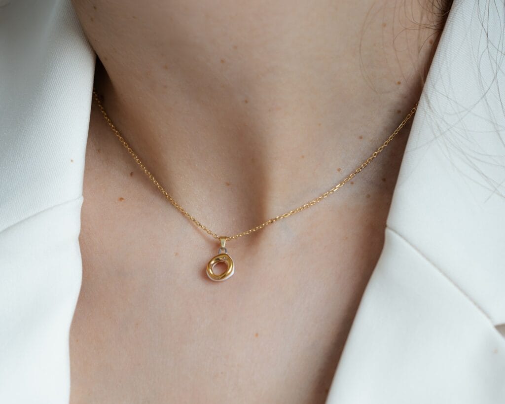White Ring handmade white porcelain pendant necklace with gold luster, front view